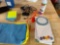 Microfiber, cleaning cloths, more towels, glass case, notepads, sticky notes, power, cord, whistle,