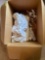 Box with pens, markers table cloth, extension cord and more