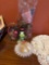 vase full of smell, good pinecones a bag of smell, good pinecones a lighthouse decor a bowl and a