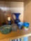shot glasses, candle, polish for chairs