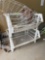 Plastic stacking shelves with 2 plant pots, metal shelving, and no mark spray for cats