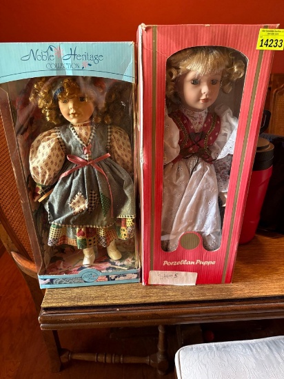 2 porcelain dolls in their box