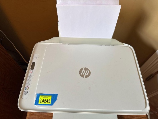 HP printer, scanner and copier, ream of paper