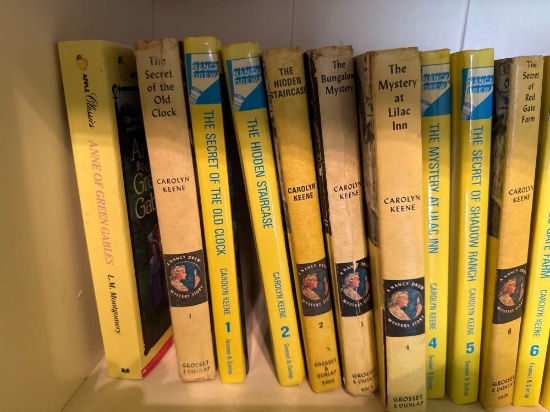 Nancy Drew mystery stories. See photos for titles.