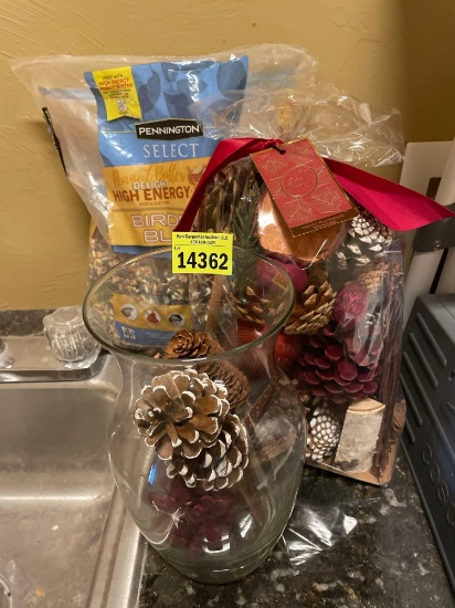 Glass vase, bag of fragranced potpourri, and bag of bird feed