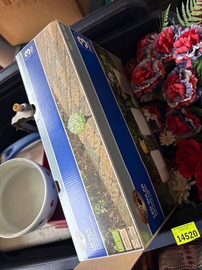 icechest, cat bowls, sprinklers, scraper, outdoor lights, and floral