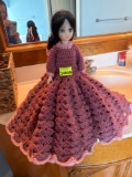 vinyl doll with crocheted dress