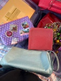Estee Lauder perfume make up bags makeup and Mardi Gras beads