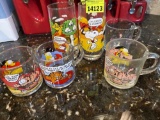 Cartoon mugs, butterfly mug, and OU mug