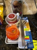 straws, pan, candles, cat mug and smell pinecones