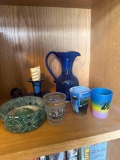 shot glasses, candle, polish for chairs