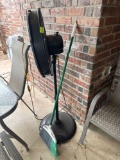 Broom and plug in fan and rug