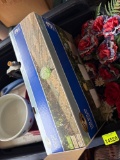 icechest, cat bowls, sprinklers, scraper, outdoor lights, and floral