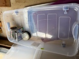 Storage tote with wheels, some cds and computer games, not all cases have cds inside