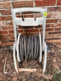 Water hose with reel and sprinkler