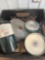Fuel filter, sheet rock tape and other items in milk crate