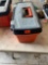 Tote with hot hands and turkey call