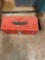 Red toolbox with misc items
