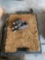 Military towing hook misc items with carpet on it