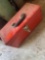 Red tool box with chain inside