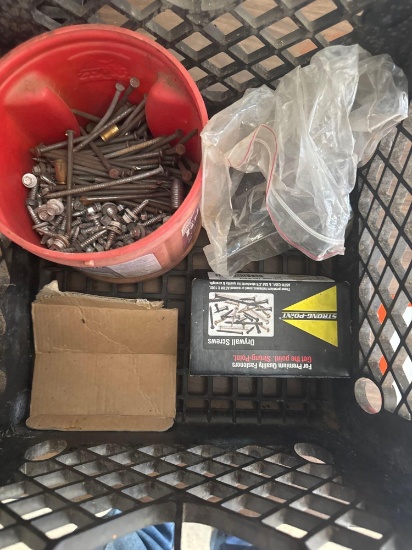 Milk crate with screws and nails
