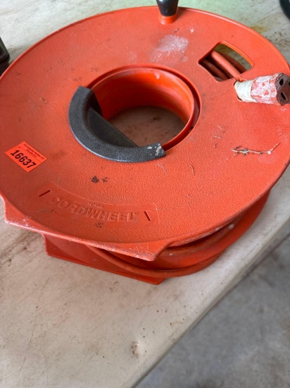 Extension cord on cord wheel