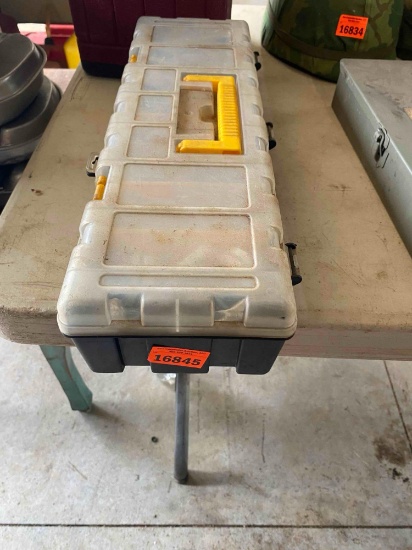 small case with electrical plug and screws