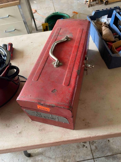 Red toolbox with misc items