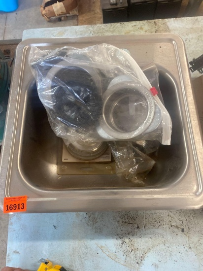 Small sink with plumbing items