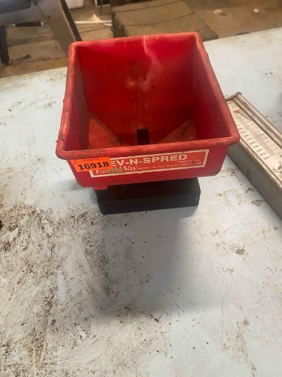 Hand held lawn fertilizer