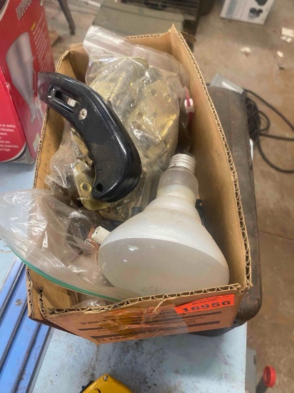Box cutter, hinges, light bulb, and door pulls