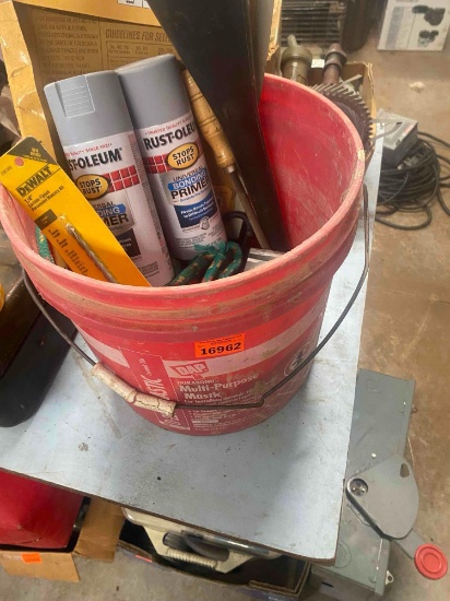 Drill bits, spray paint, rope, funnel and more in 5 gallon bucket