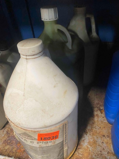 Bottles of various liquids-Silicone, MSMA and one with no label Contents unknown
