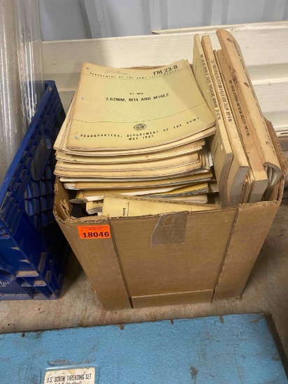 Box full of Army manuals