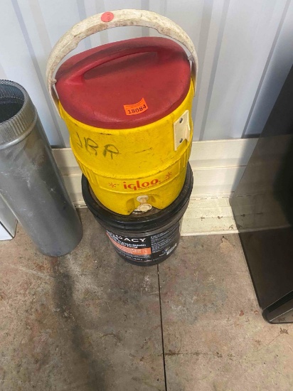 Igloo water jug, 5 gallon bucket labeled Tractor transmssion & hydraulic fluid Contents unknown