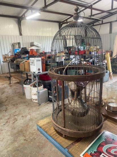 Bird cage with wooden owl