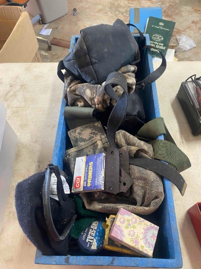 Blue crate with military belts, shotshell, Sno-seal, canteens, misc ammo