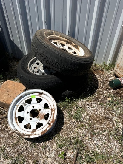 Old tire and wheels *BUYER IS RESPONSIBLE FOR LOADING*