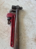 Hammer and pipe wrench