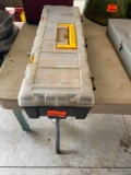 small case with electrical plug and screws