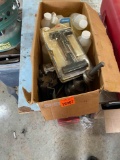 Tire repair kit, Rubbing Alcohol, and pieces to a vintage meat grinder