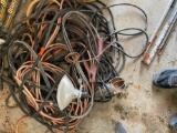 Lot contains drop light, jumper cables, extension cords and other misc items