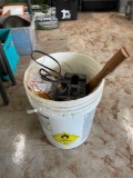 5 gallon bucket bag of fence insulators, Snap on battery charger, screws , spool of wire and more
