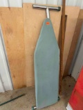 Ironing board and miscellaneous pieces of wood