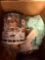 Baby doll, towels, baby wipes, ballpoint, paint tubes, Unopened Christmas, tin cam, bathroom, rugs,