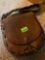 leather bag, with engraved sun