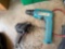craftsman electric stapler, jumper cables, soldering gun, two Makita drills, air vacuum pump, oil