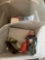 Tote with misc items inside, light covers, door knobs, and more