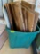 Storage tote with boxes on back porch