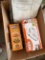 Box with Apple peeler slicer, mini shark, vacuum cleaner, tortilla pan set, and more